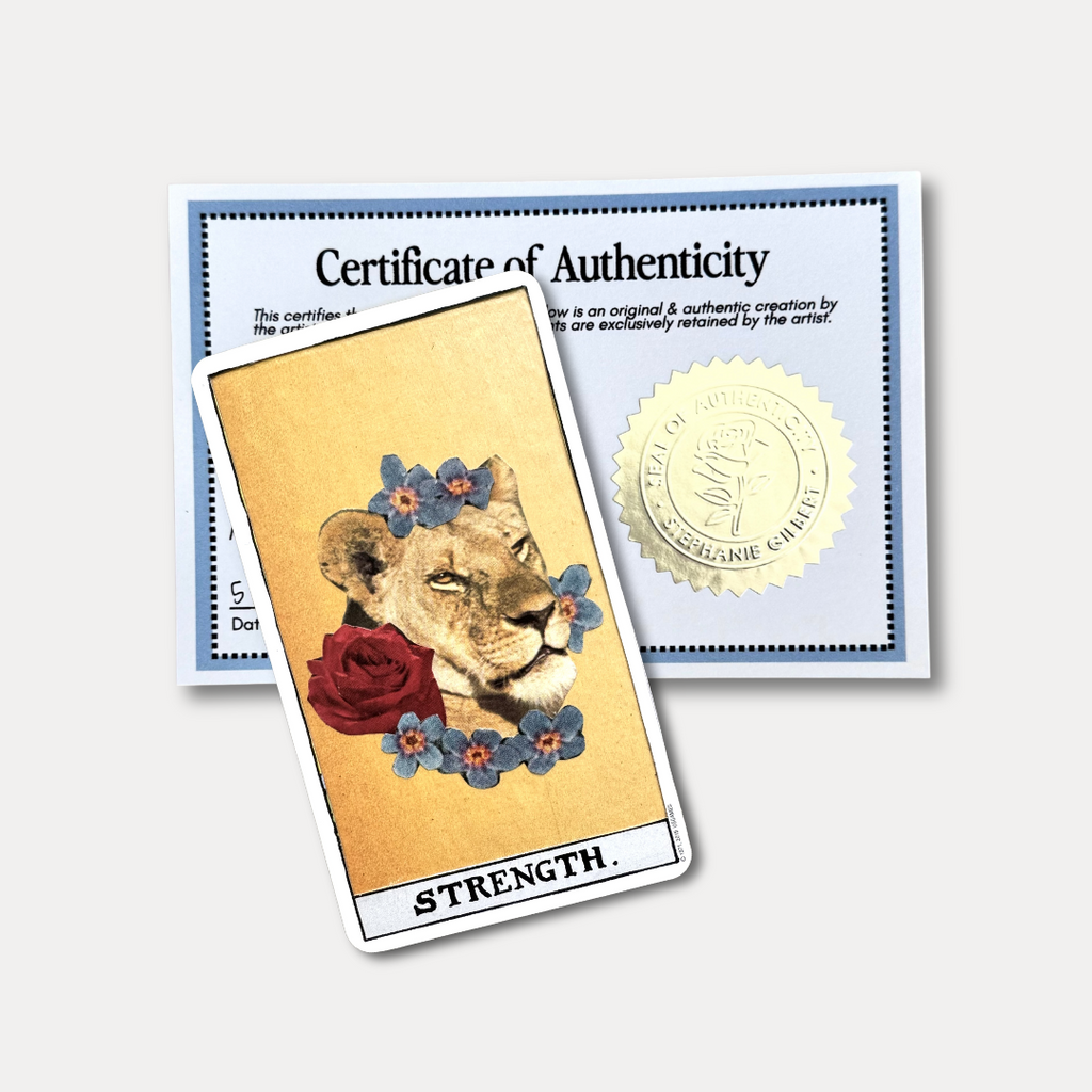 Tarot card titled 'Strength' with a certificate of authenticity on a light gray background