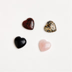 heart shaped crystal assortment on white surface