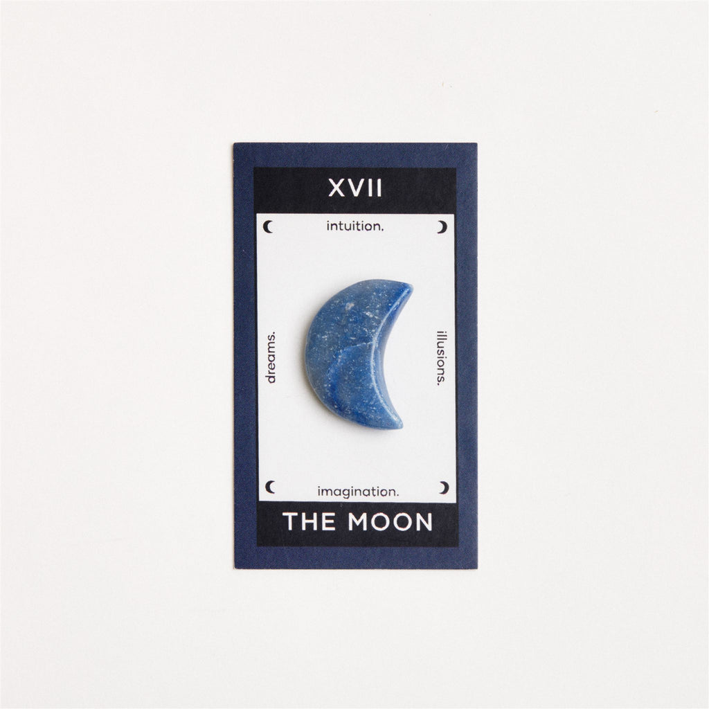 blue quartz moon on white surface