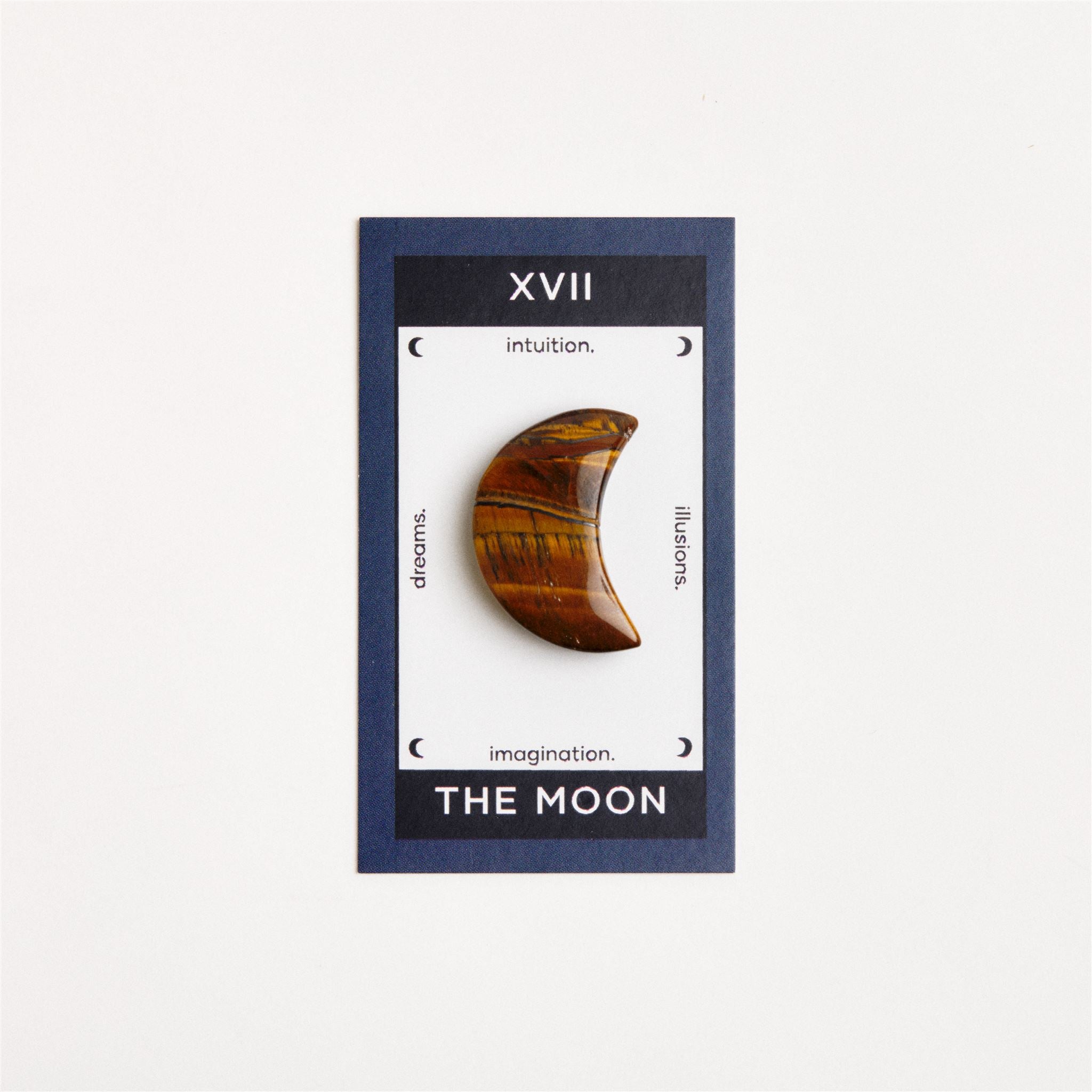 tiger eye moon on white surface