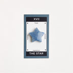 blue quartz star on white surface