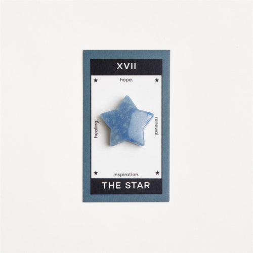 blue quartz star on white surface